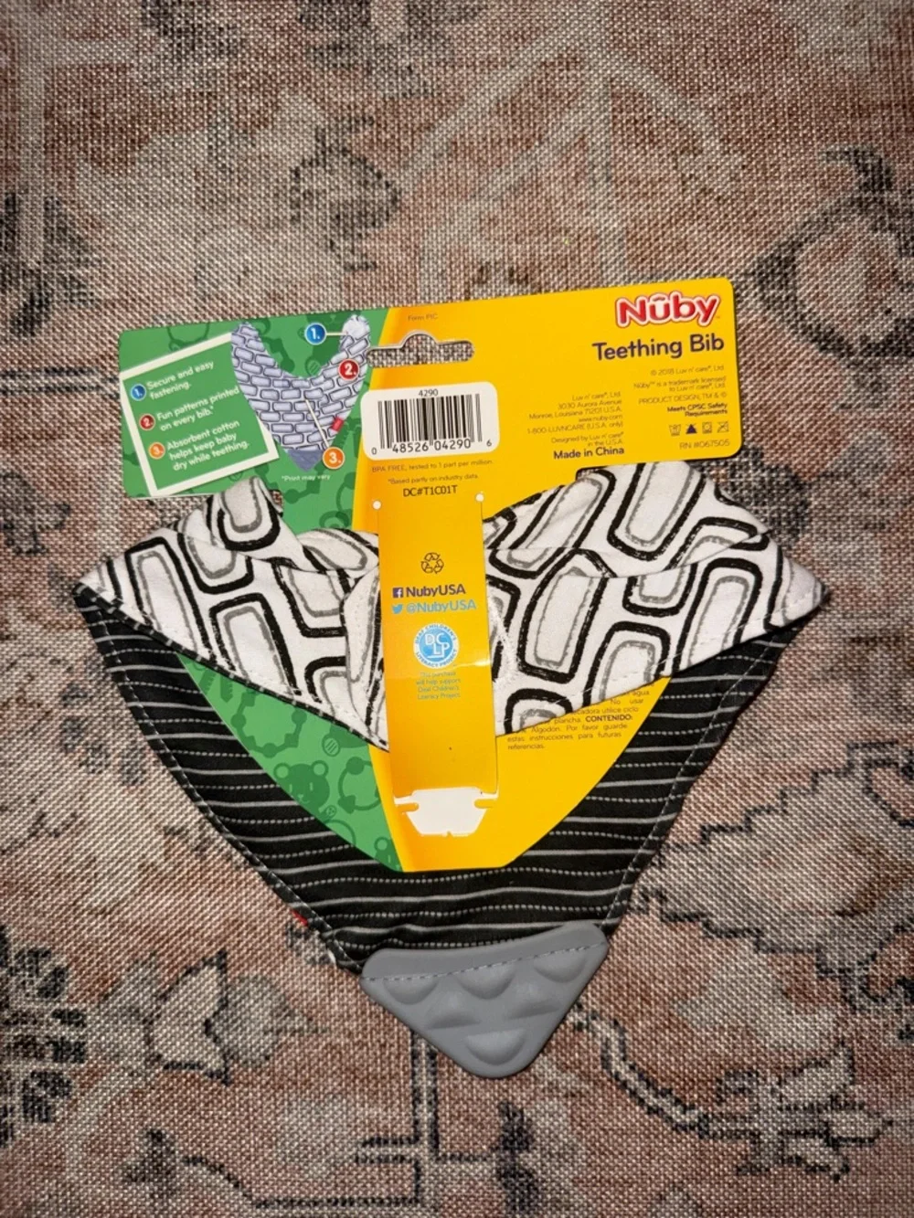 Brand new Nuby Teething Bib in Black & White with Teething Corner